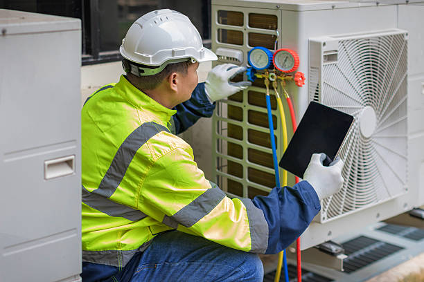 Professional Hvac technician working in Otisville, MI
